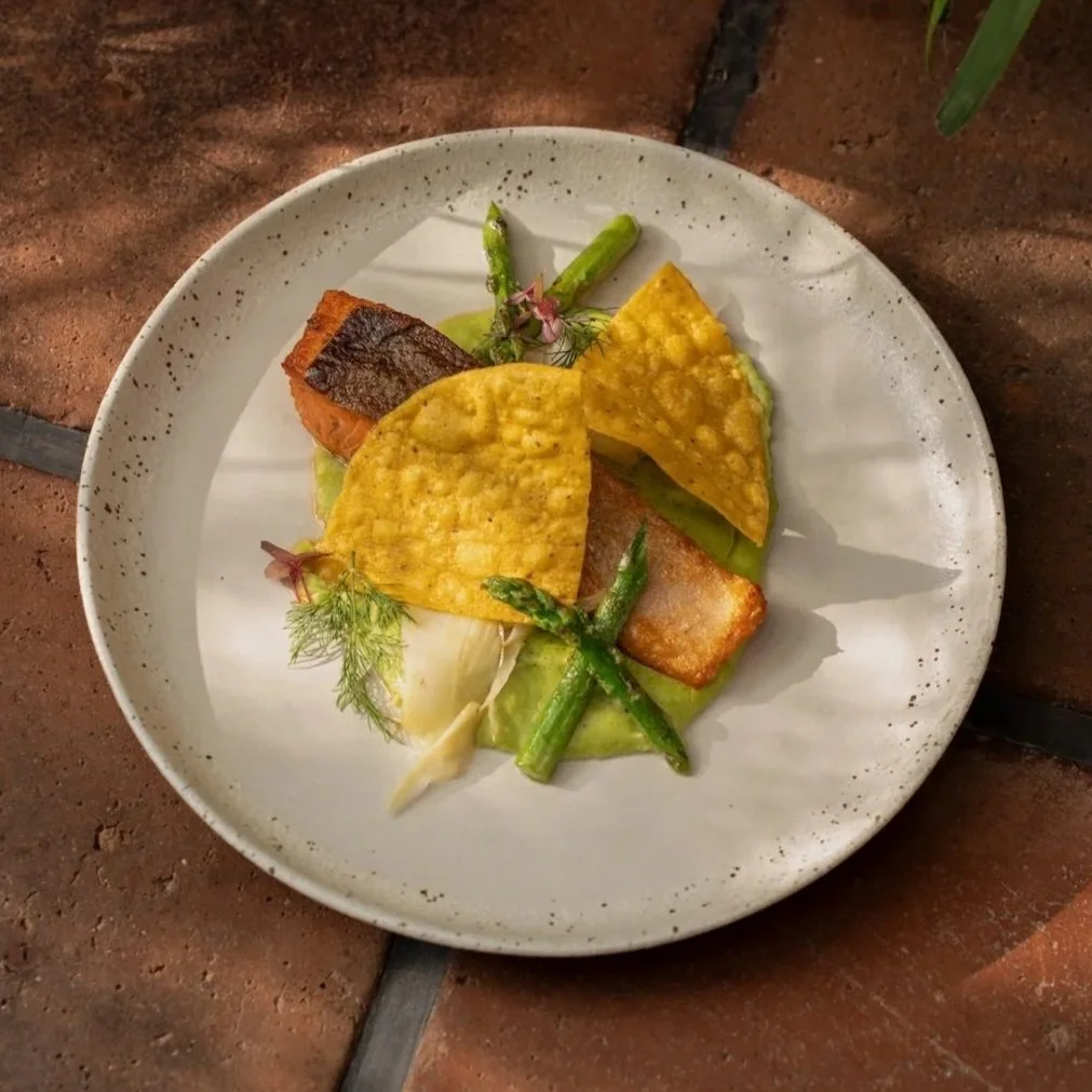 GRILLED TASMANIAN SALMON creamy basil oil, asparagus, green pea puree, corn chips, pickled fennel