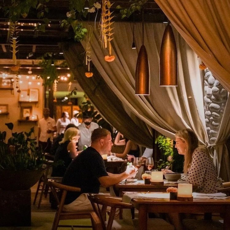 a couple enjoys cocktails at ubud best bar