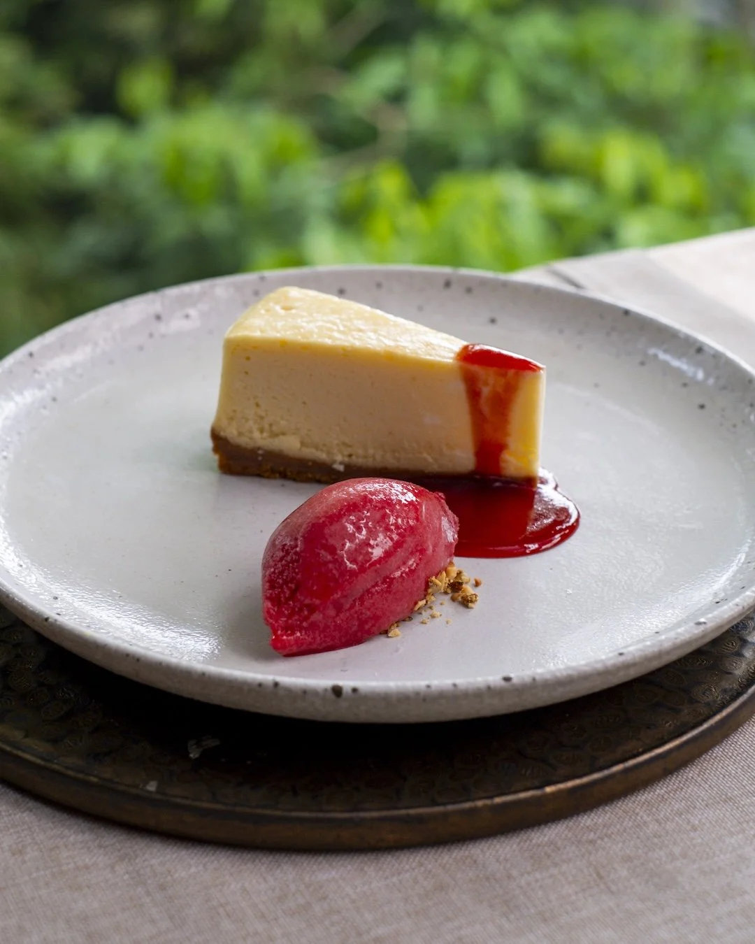 cheesecake with raspberry ice cream at ubud restaurant