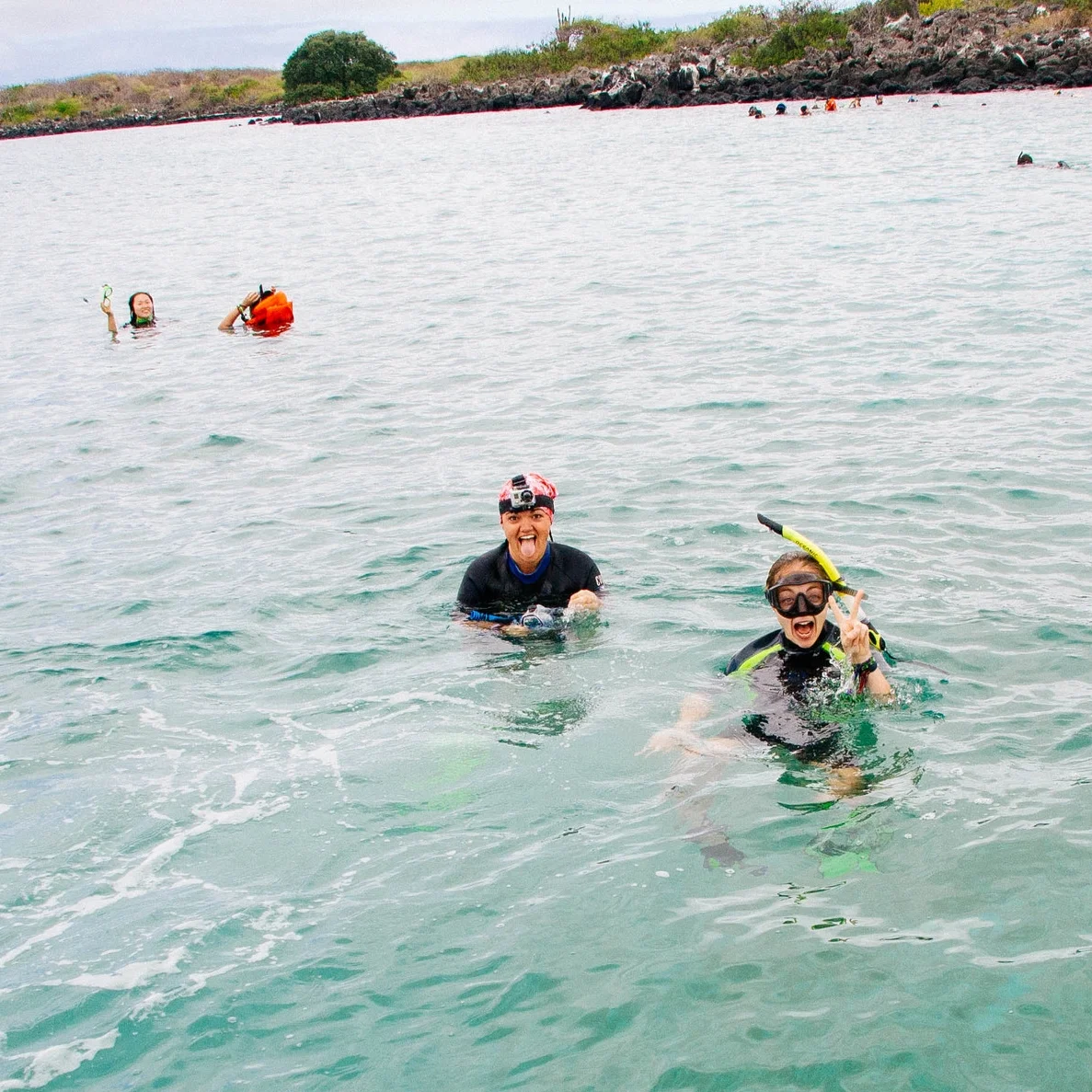 Monique and I snorkeling with sea lions off the Galapagos islands