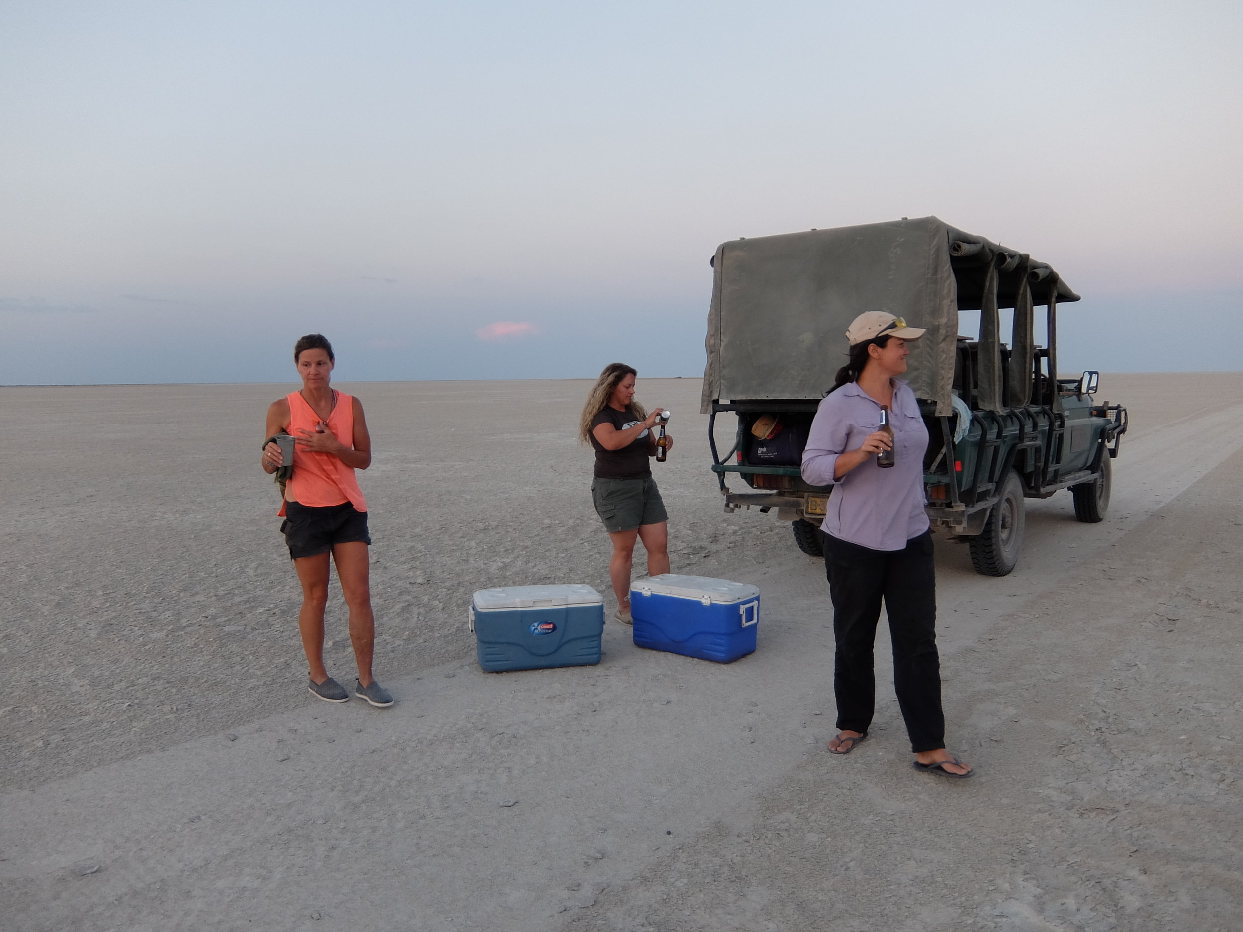 Having a beer at sunset on a salt flat