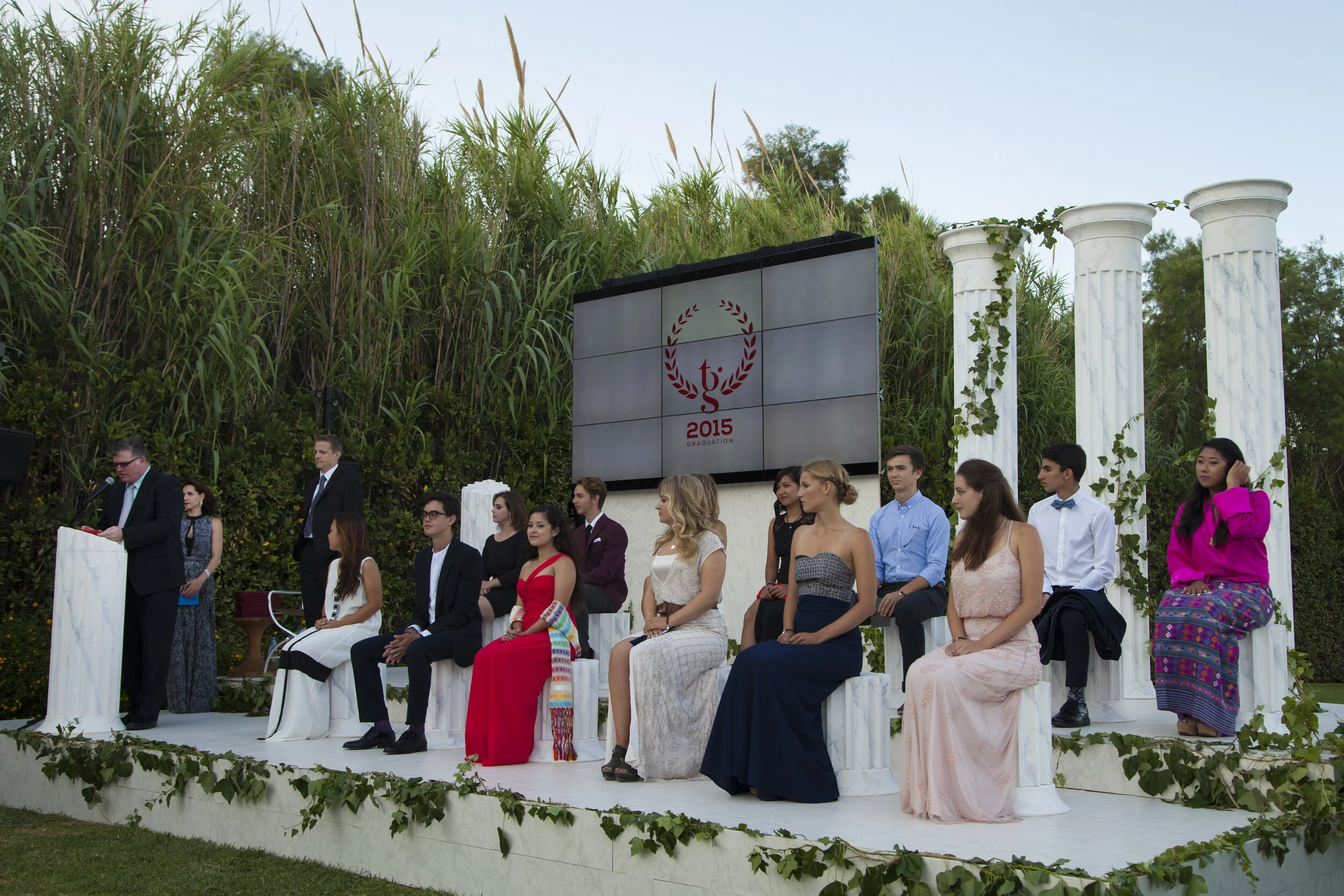 the-soon-to-be-graduates-listen-to-a-speech-by-head-of-school-jamie-steckart-athens-greece_19804590162_o.jpg