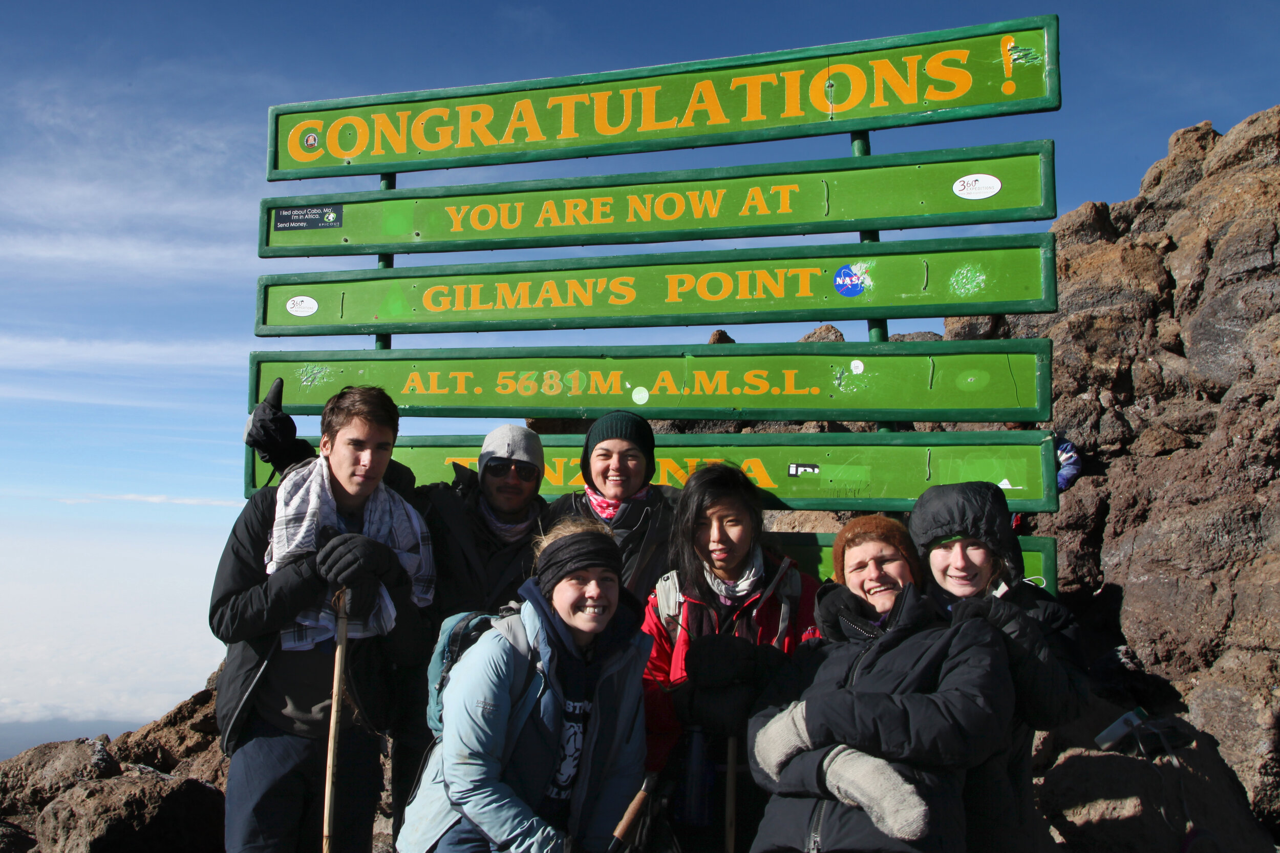 lindsay-celebrating-the-summit-with-the-seniors-mt-kilimanjaro-tanzania_15228570721_o.jpg