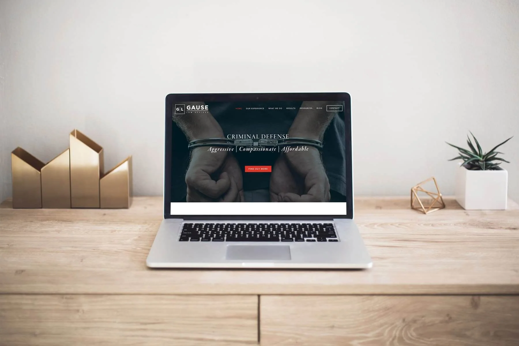 Emily-Gause-Law_rebrand-website-laptop.jpg