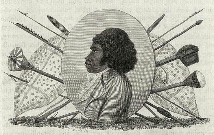 This is an engraving made by James Neagle in England in 1798. It features an oval portrait of Bennelong wearing a ruffled shirt, waistcoat and frockcoat. A number of Indigenous Australian weapons are depicted in a formal arrangement behind the portrait; these include two shields, a woomera (spear thrower), a hafted axe and various types of spears. 