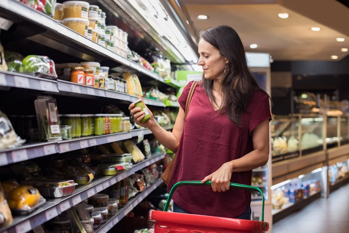 Optimized-Woman checking labels (smaller size).jpg