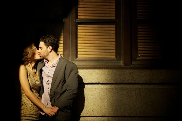 Engagement photo kissing outside Legislative Council Building in Central, HK