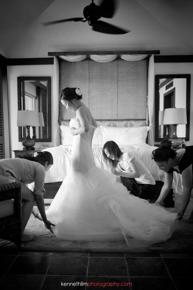 Kona Hawaii US Wedding outdoor bride putting on gown dressing getting ready