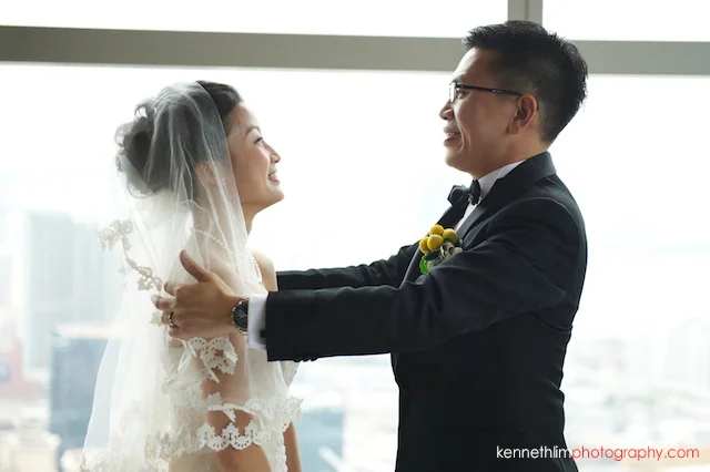 Hong Kong Wooloomooloo Prime wedding groom lifts brides veil