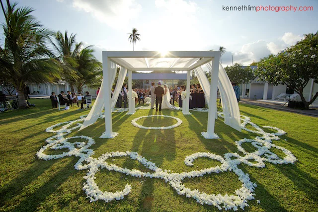 Koh Samui wedding YL Residence bride and groom at the altar during sunset