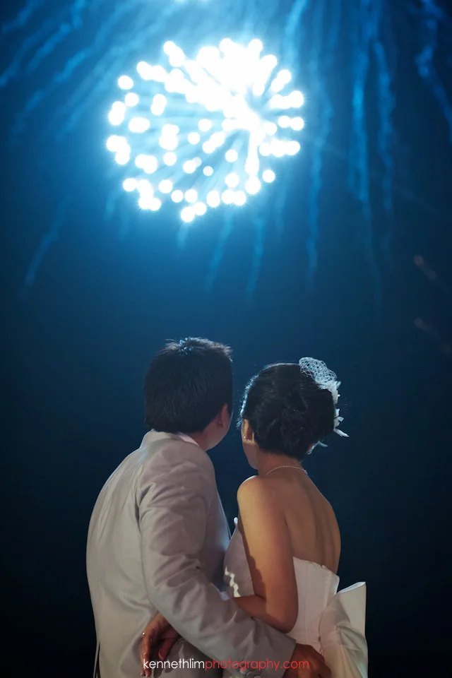 Koh Samui wedding YL Residence bride and groom outdoor watching fireworks hugging