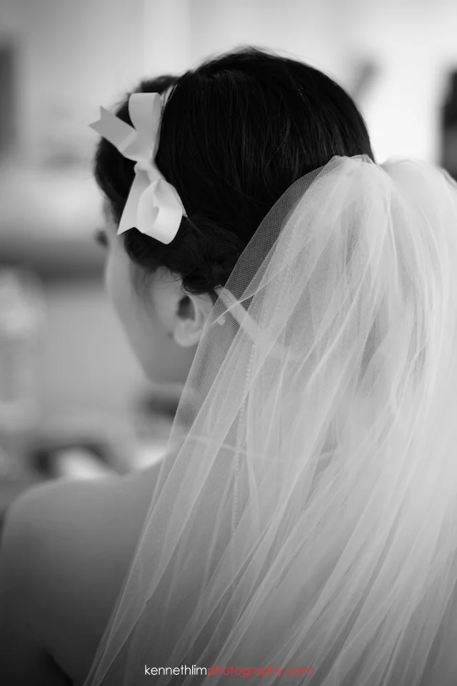 Koh Samui wedding YL Residence bride looking away with head turned wearing wedding veil