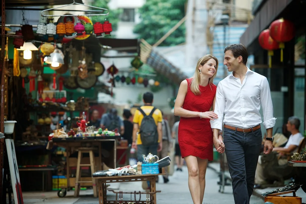 Hong Kong Soho engagement photography couple photoshoot walking holding hands laughing together