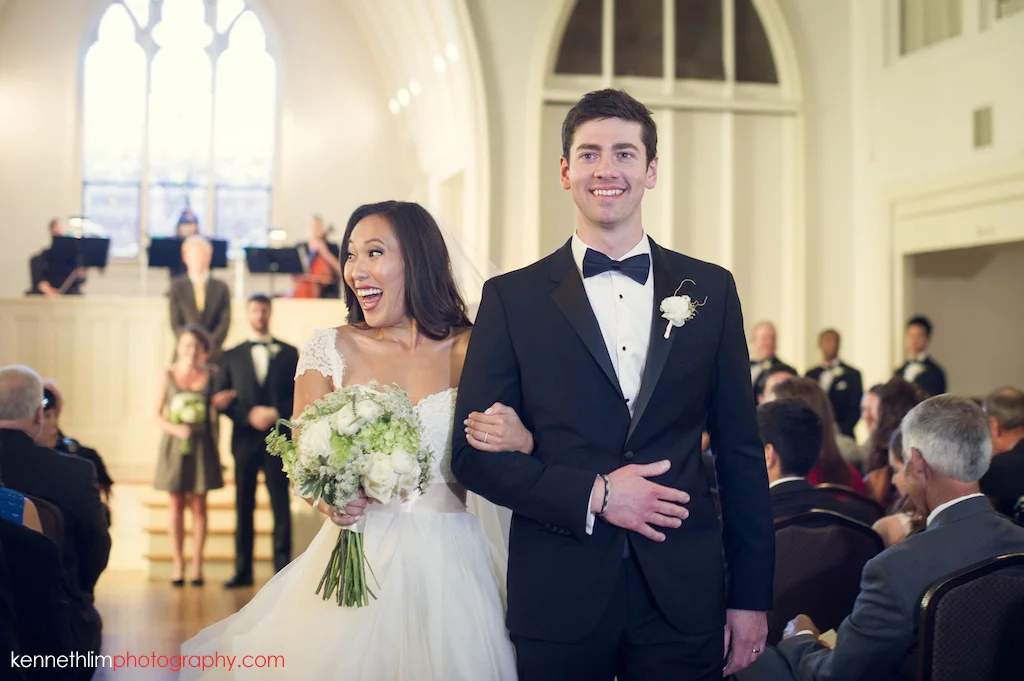 Atlanta wedding Kairos Church big day photography bride and groom march out happily
