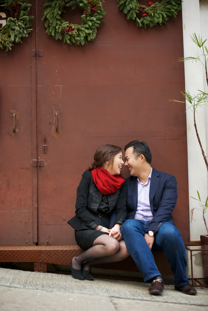 hong-kong-pre-wedding-engagement-photographer-couple-smiling-together-leaning-in-soho-central.jpg