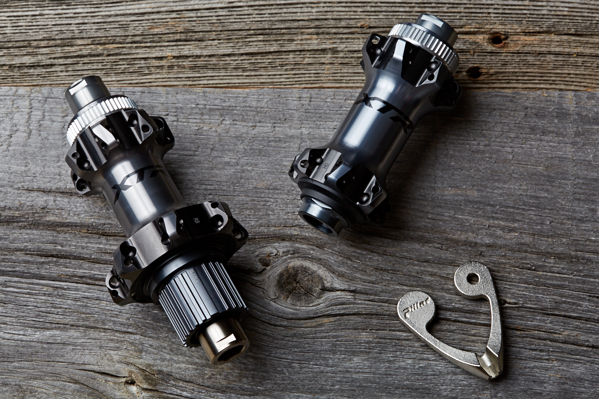 Shimano’s XTR Micro Spline 12 speed hubs in a straight pull spoke configuration with centrelock disc brakes.
