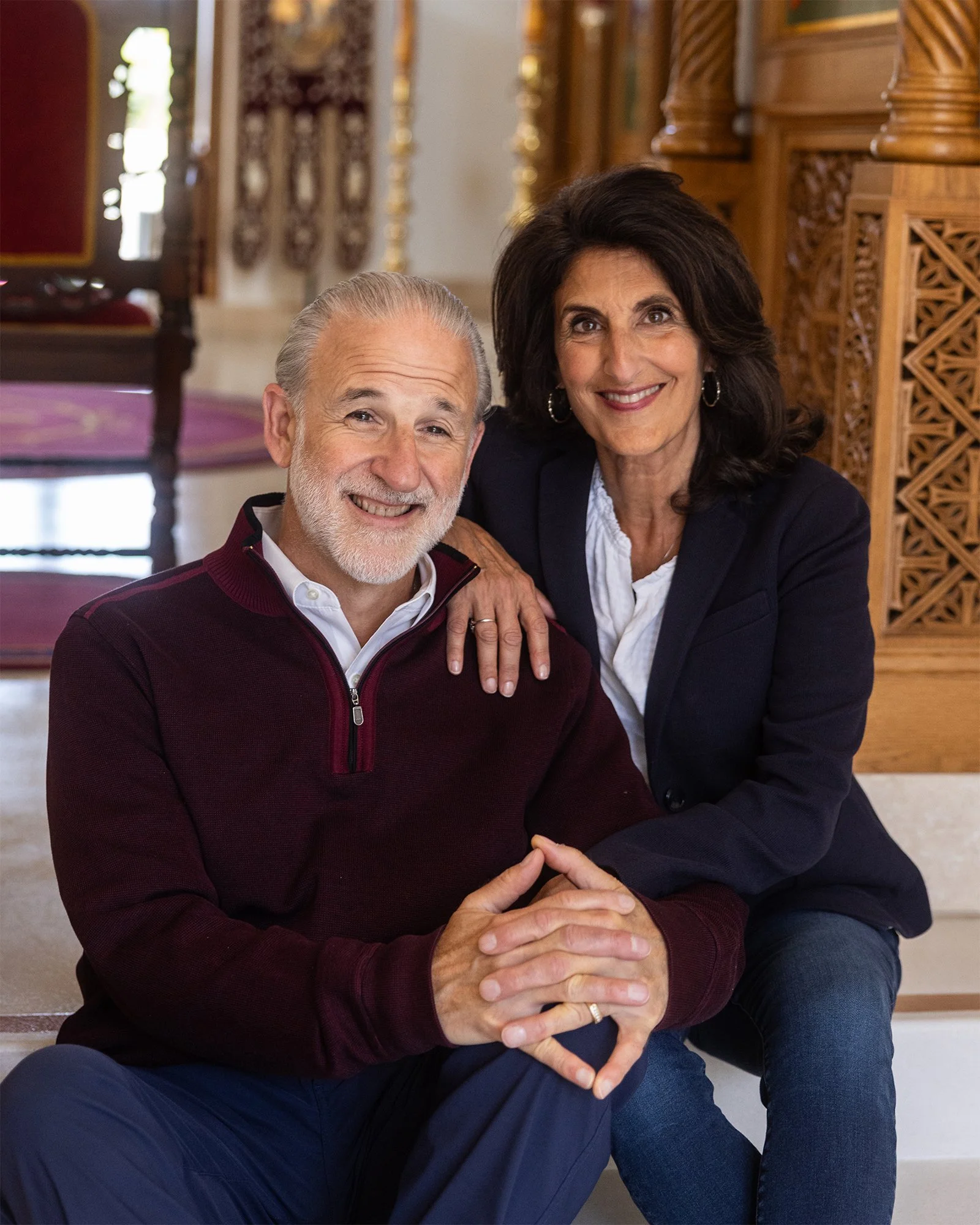 Authors Cindy and Paul Karos sitting together inside an Orthodox church