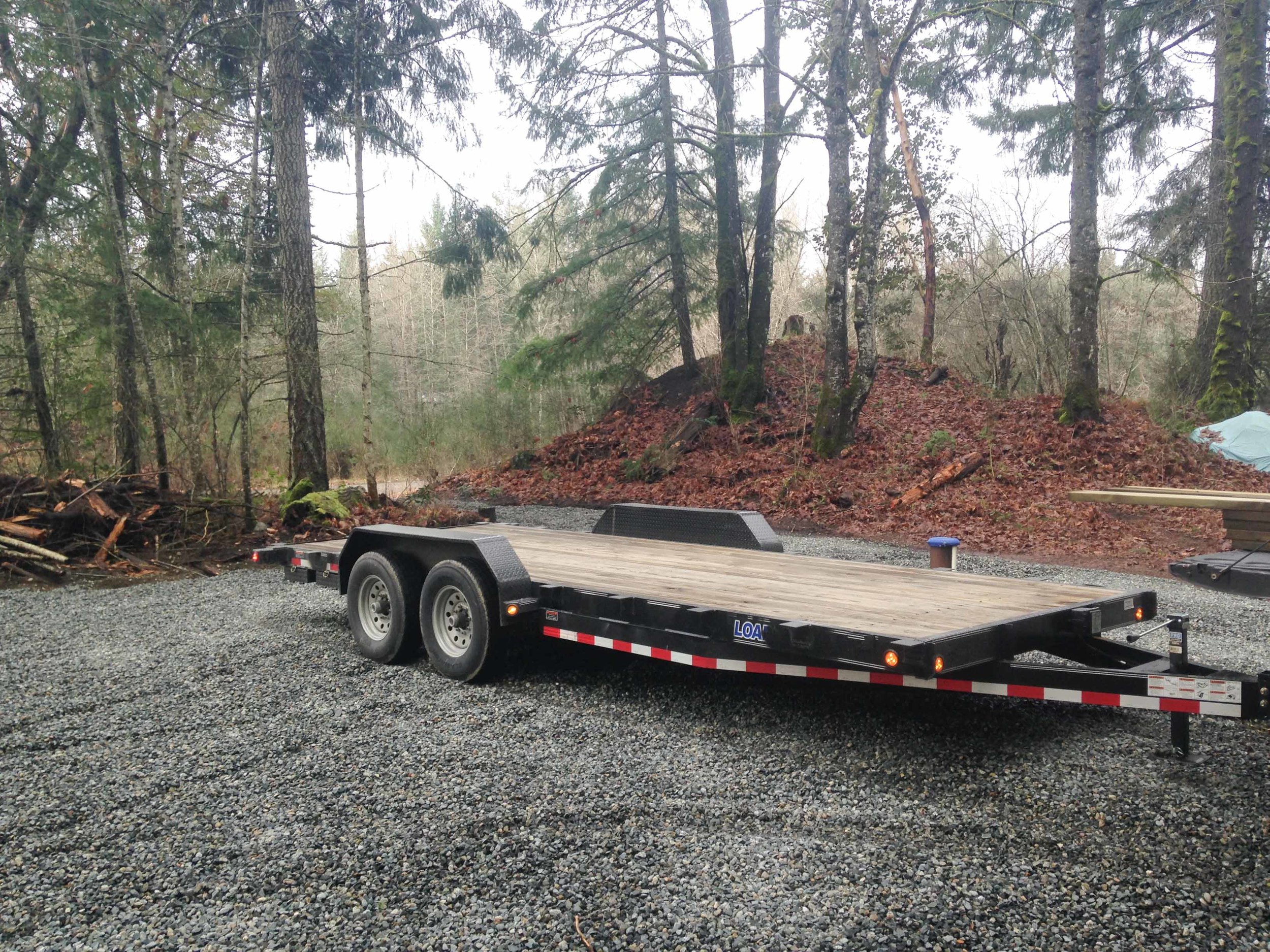 This is the custom 8×20 trailer that we purchased, right after we towed it back to the job site. Now the work starts!