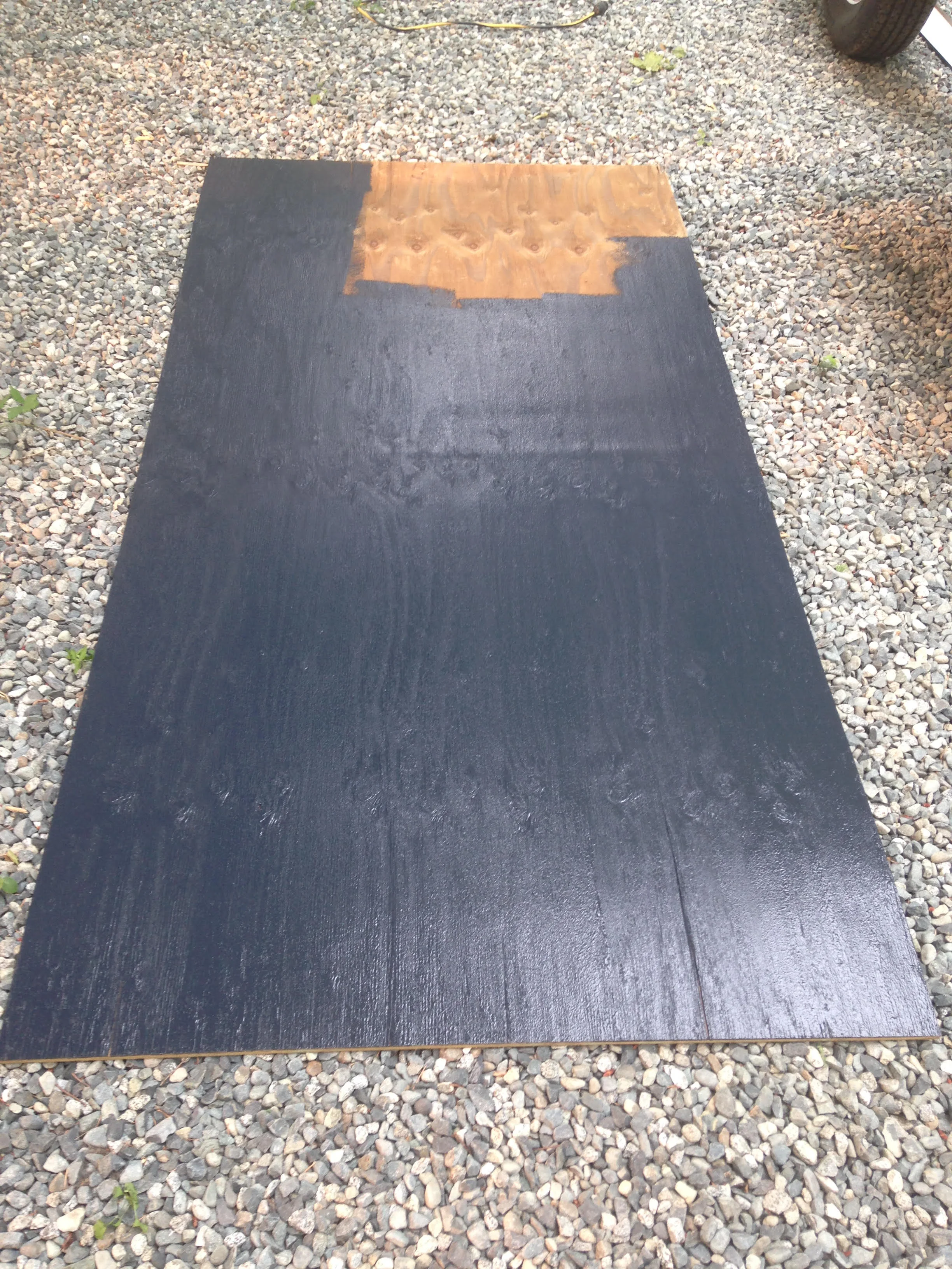 Sealing the bottom of the house with marine grade water sealant paint.