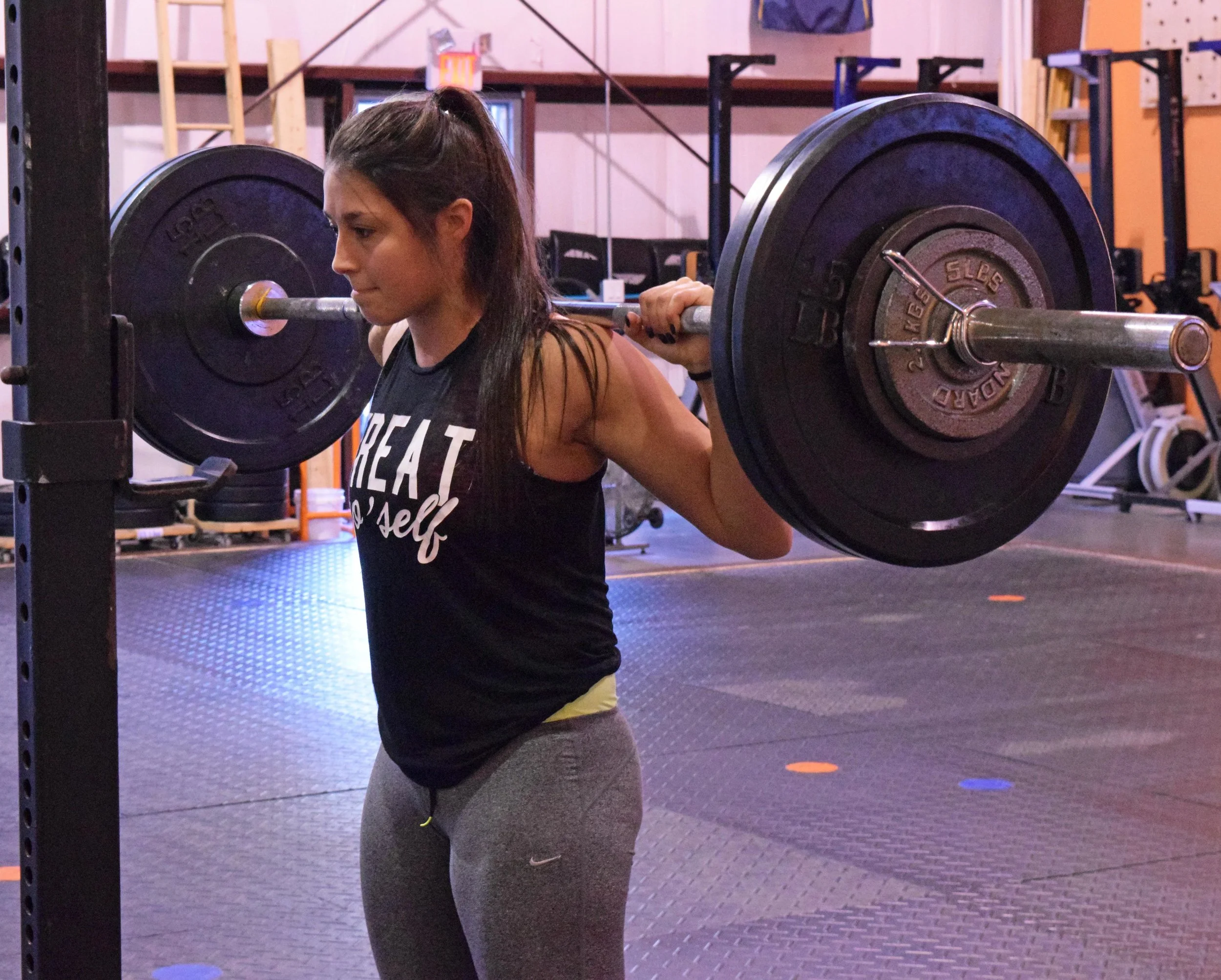 Jordan enjoying some pain-free squatting at Momentum Fitness.