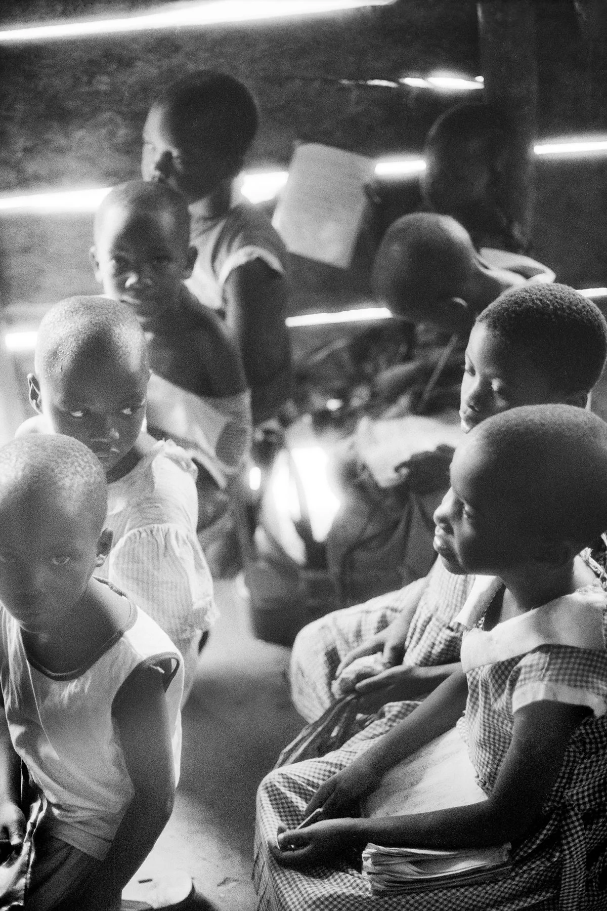 Photographer: Anyango Florence. Age: 29 years. Occupation: Teacher at BESO Junior School. "I wanted to show how our students at BESO Junior School focus in class. Some are super attentive. They squeeze onto the seats. "