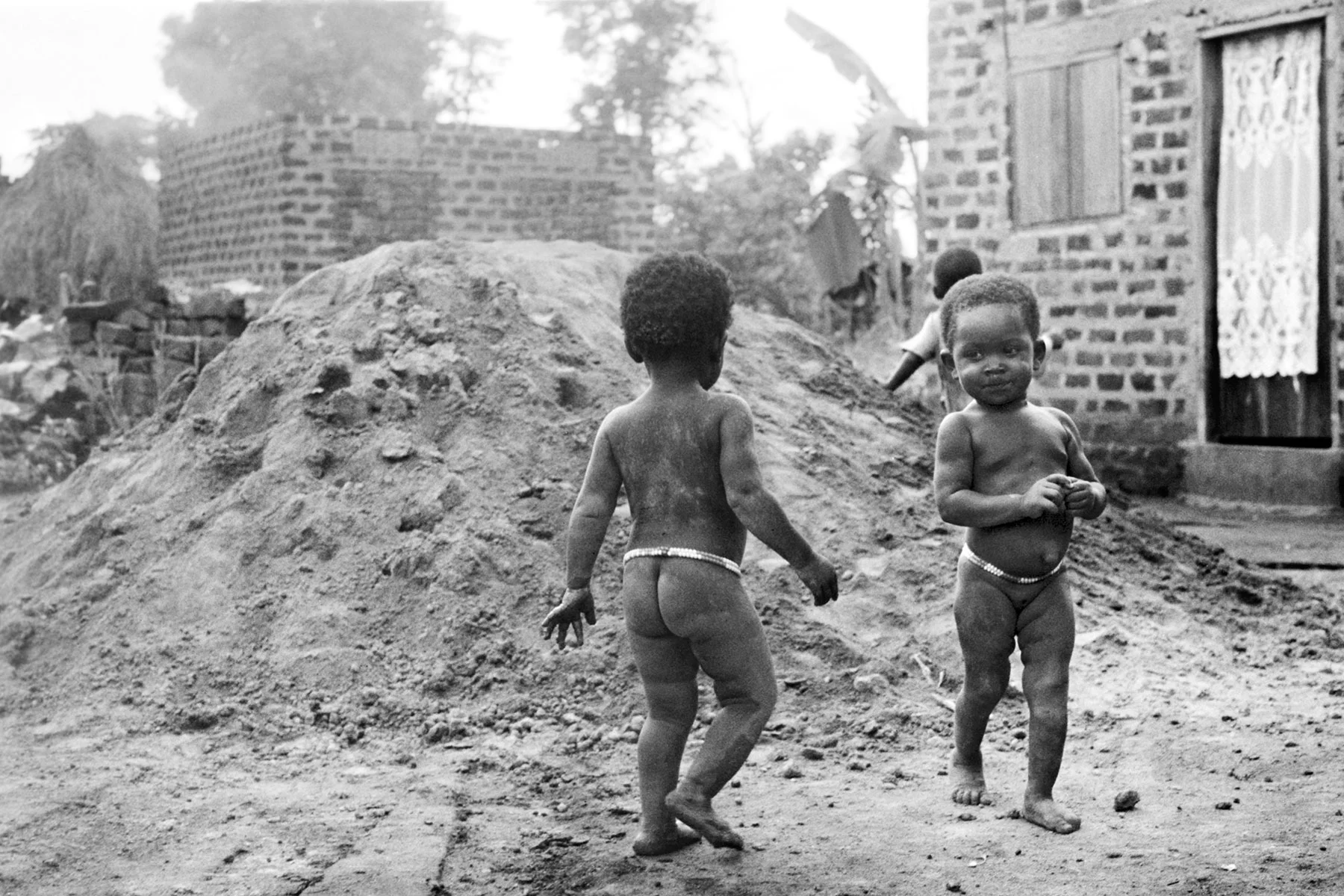 Photographer: Gladys Namugaya. Age: 30 years. Occupation: Farmer. "My baby girl enjoys playing with my neighbor's daughter. They are friends at that very little age. It's adorable."