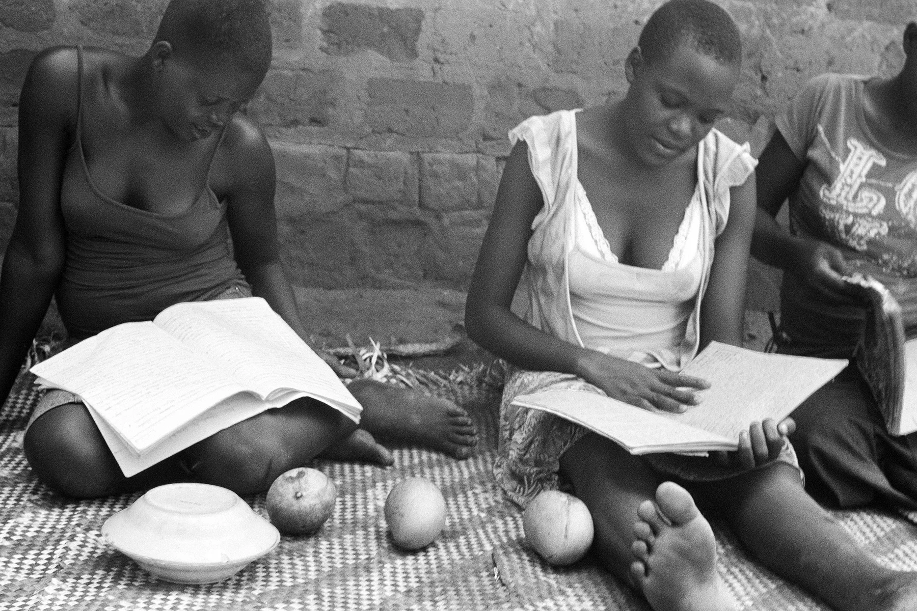 Photographer: Nassali Mariam. Age: 39 years. Occupation: Farmer. "These are my girls studying so that they can pass the entrance exams to graduate from BESO Junior School and carry on to their senior grades at a boarding school in Kampala. I am so proud of their hard work."