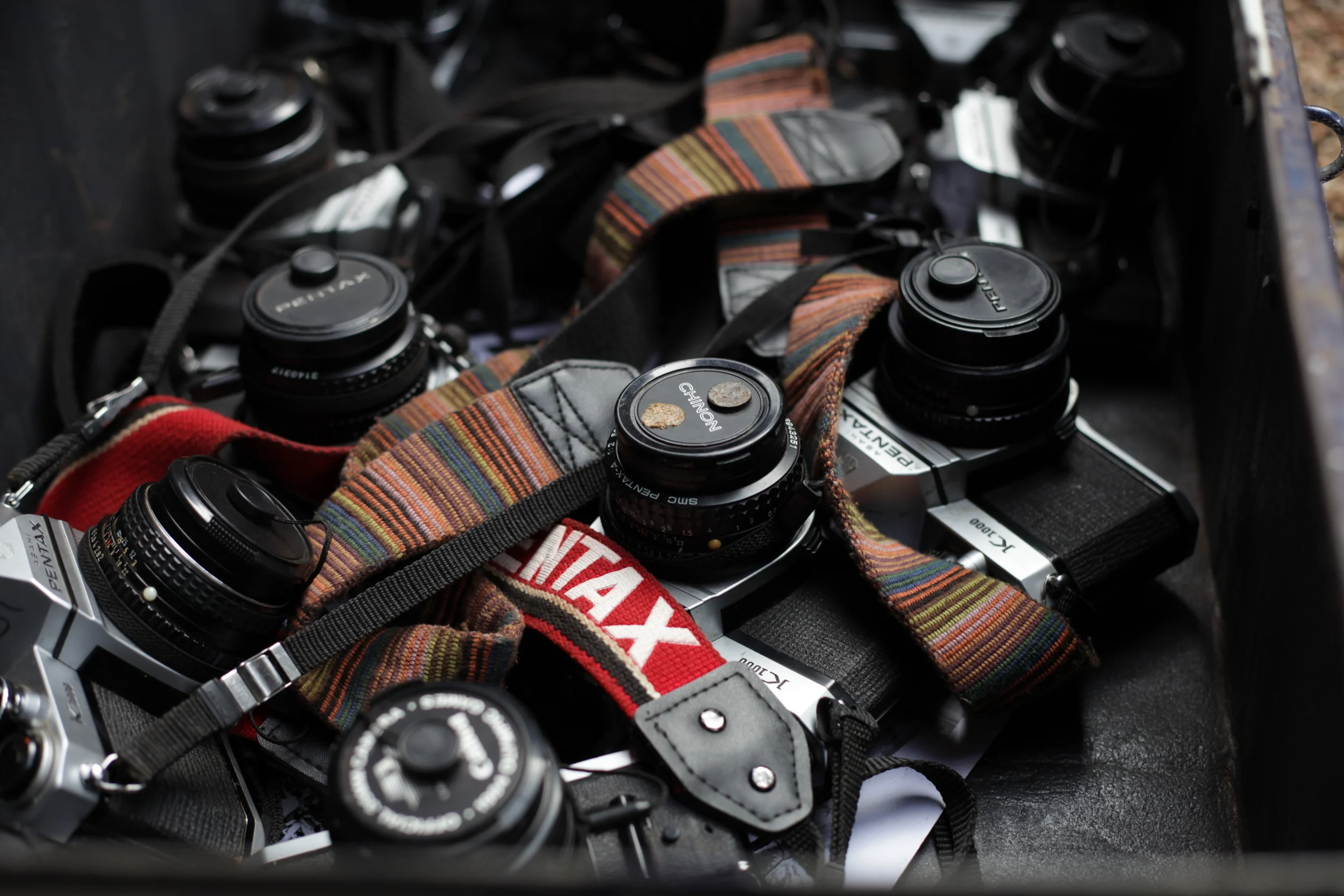  These are the cameras that were distributed to the Wanteete Photo Collective for the project duration. They were primarily Pentax K-1000 models from the 1980s. We shot entirely Kodak Tri-X film. All supplies were generously donated by the Film Photo