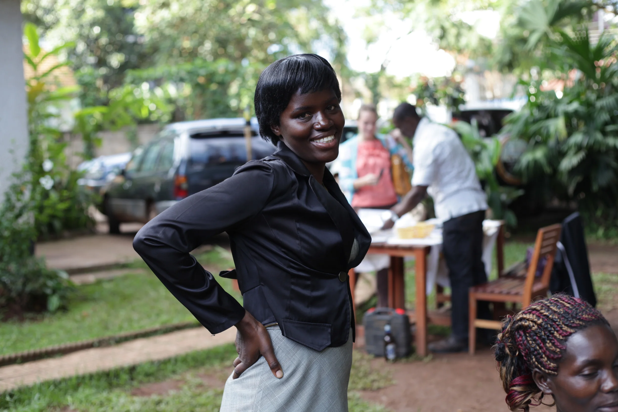  BESO Foundaiton Facillitator and Accountant Esther Nakityo striking a pose at the  Picturing Wanteete  Kampala Exhibition.&nbsp; 