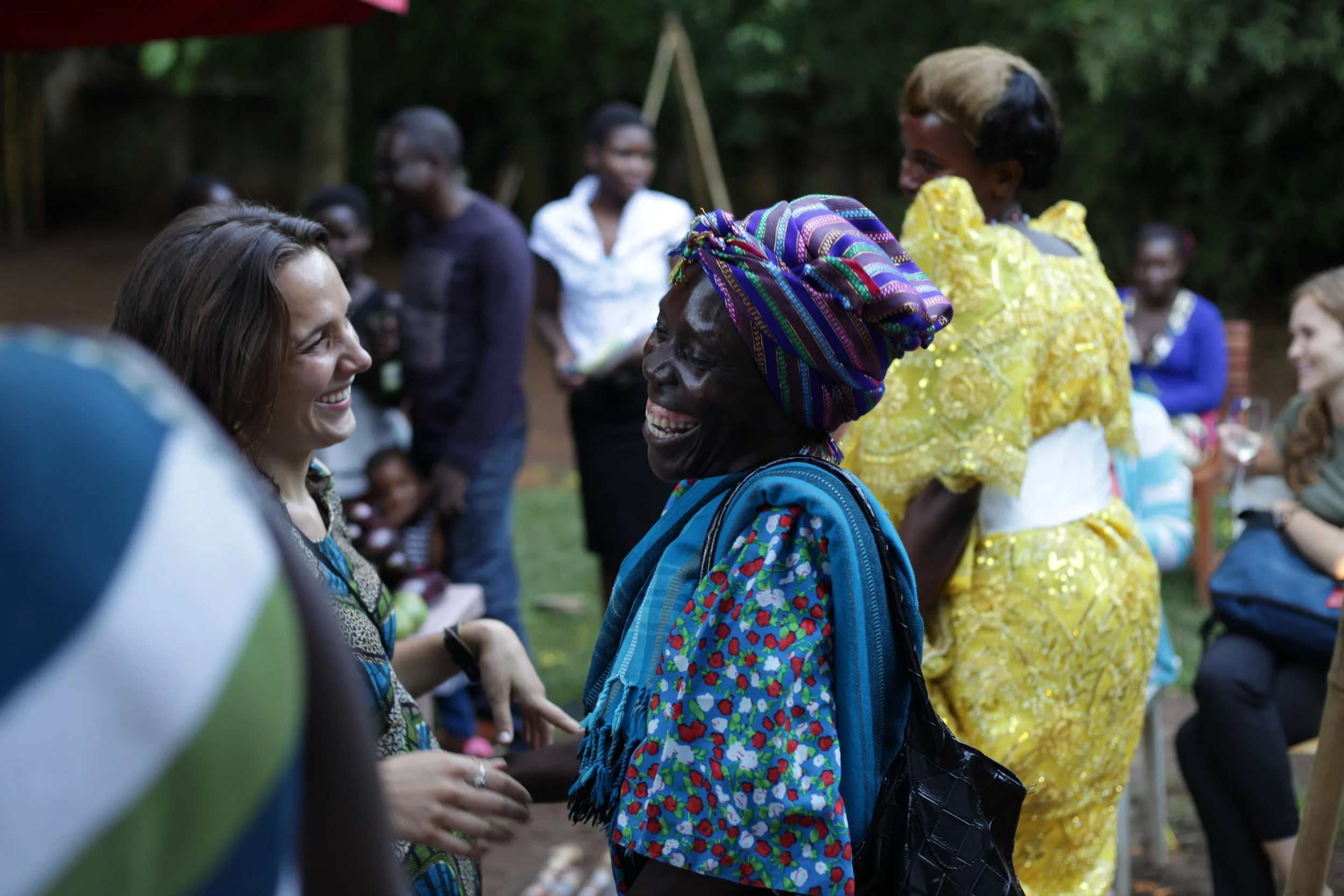  WPC member Athieno Jane and Project Director Louise Contino share some collective joy over the  Picturing Wanteete &nbsp;Kampala Exhibition in May of 2014. 