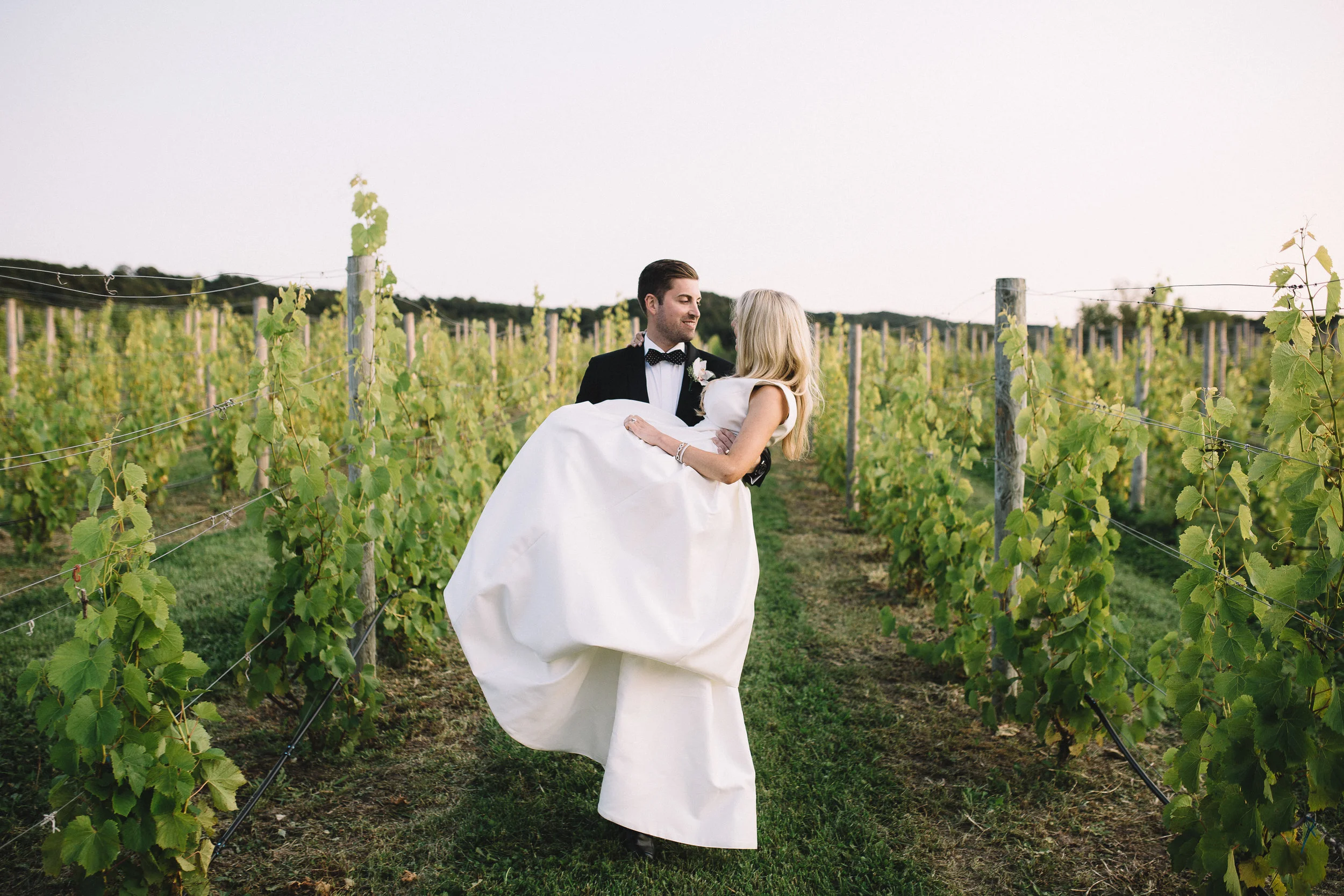 The lovely wife and I on our wedding day in Leland, MI | Photo by @lukeeonorris