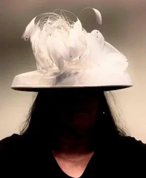 Gathering of costume elements: a large brimmed women’s hat from a second hand store. Photo: Deborah Hunt