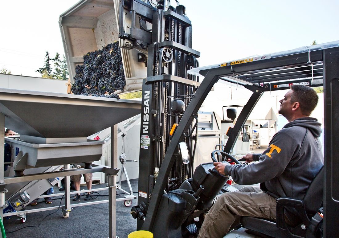 chris on fork lift.jpeg