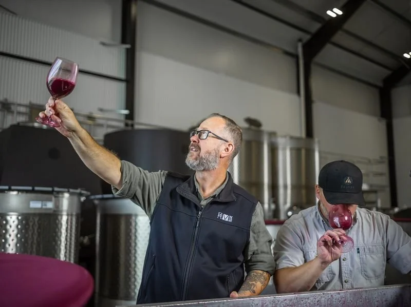 ray and raised glass.jpeg