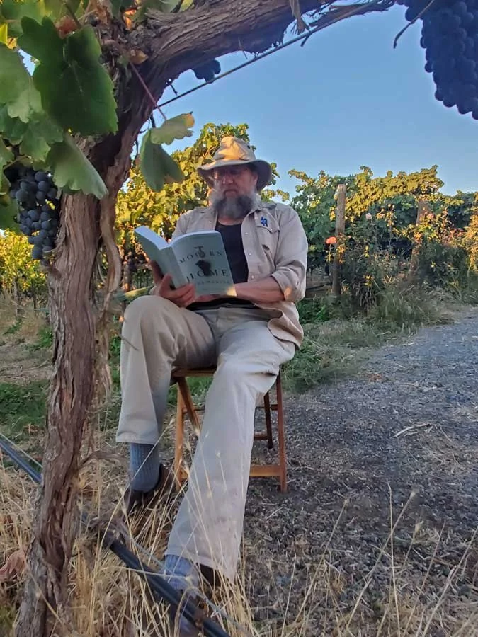 Marty-Reading-in-the-Vineyard.jpg