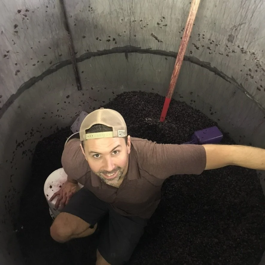 isaac in vat of grapes.jpg