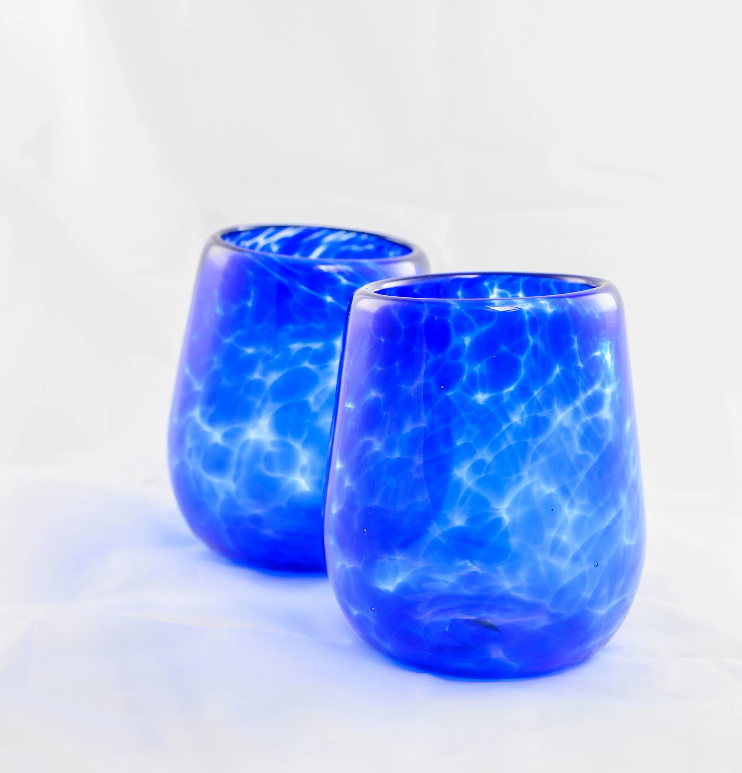 blue wine glasses white background.jpg