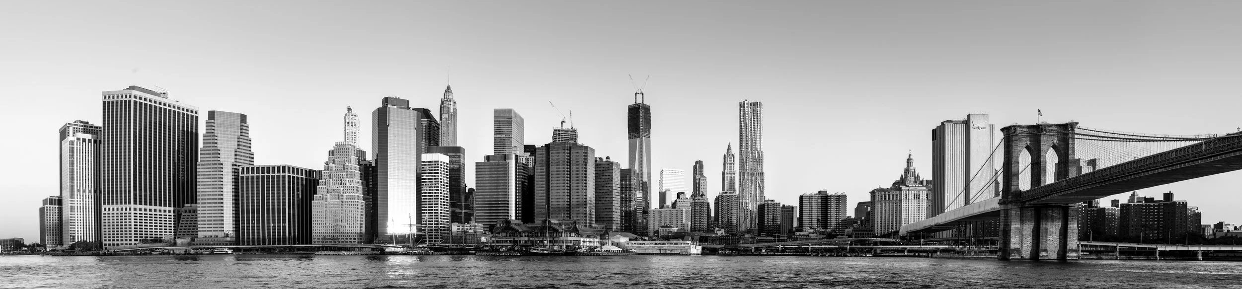 stock-photo-looking-across-to-new-york`s-lower-manhattan-skyline-at-sunrise-130976611.jpg