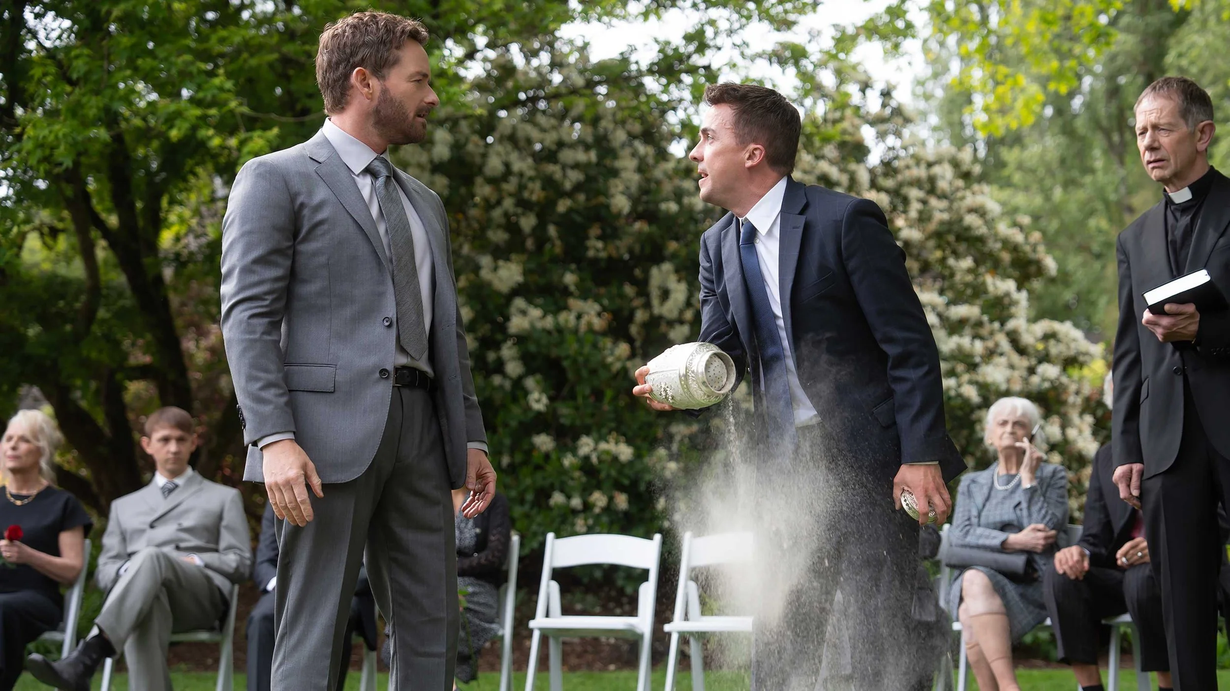frankie-muniz-s-malcolm-pouring-out-an-urn-of-ashes-while-talking-to-christopher-masterson-s-francis-in-malcolm-in-the-middle-life-s-still-unfair.jpg