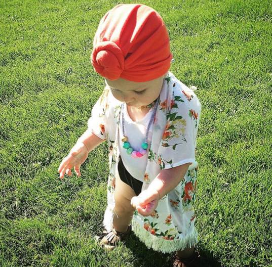 @little.miss.kaia In her Mandy Tangerine Mini headwear, Coral and Cloud necklace, Bunny Moon Designs kimono, and Minimoc Moccasins. 