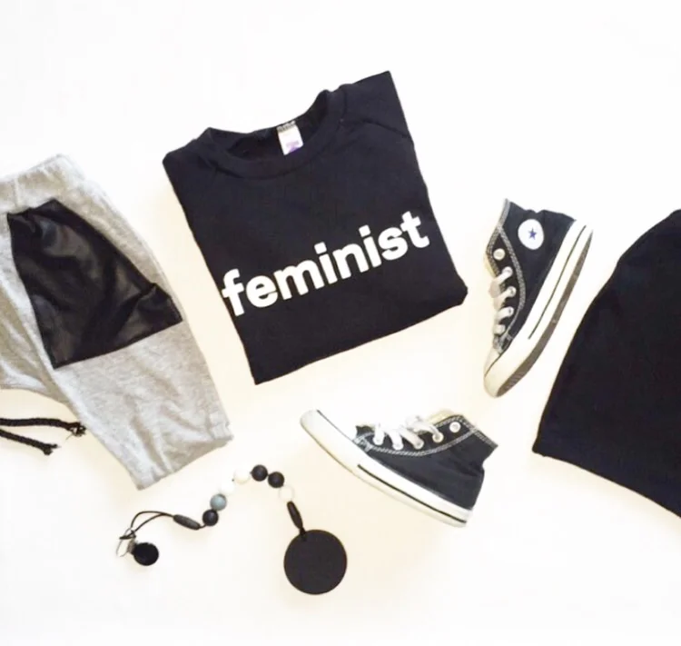 Grey harem joggers with vegan faux leather pockets and black beanie: Tiny Button Apparel | Cookie teether: Glitter and Spice | "Feminism" pullover: WuChild | Shoes: Converse 