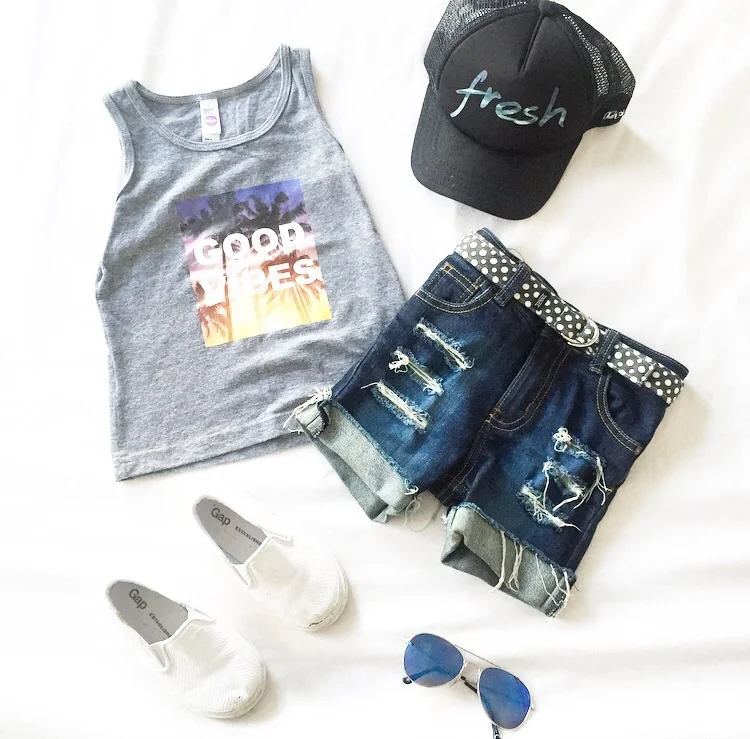 Vagabond Babe 'Fresh' mesh trucker hat & 'Good Vibes' tank / Tattrd Threads Denim Shorts / Monkey and Peanut belt / Gap slip on shoes / H&M sunnies