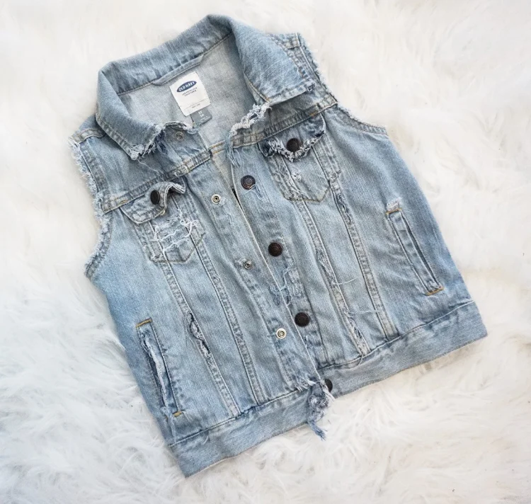 Vest was originally a dark wash denim jacket I found at Old Navy on sale for $6.99. I soaked it in bleach and water for 30 minutes and then washed and distressed it.
