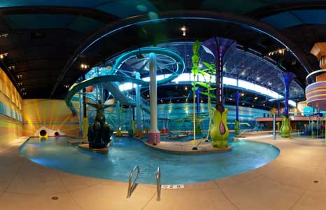 Night time indoor water park with lighting effects at the Radisson Hotel in Albuquerque, NM