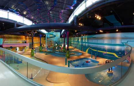 Night time indoor water park with lighting effects at the Radisson Hotel in Albuquerque, NM