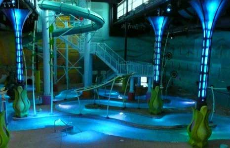 Night time indoor water park with lighting effects at the Radisson Hotel in Albuquerque, NM