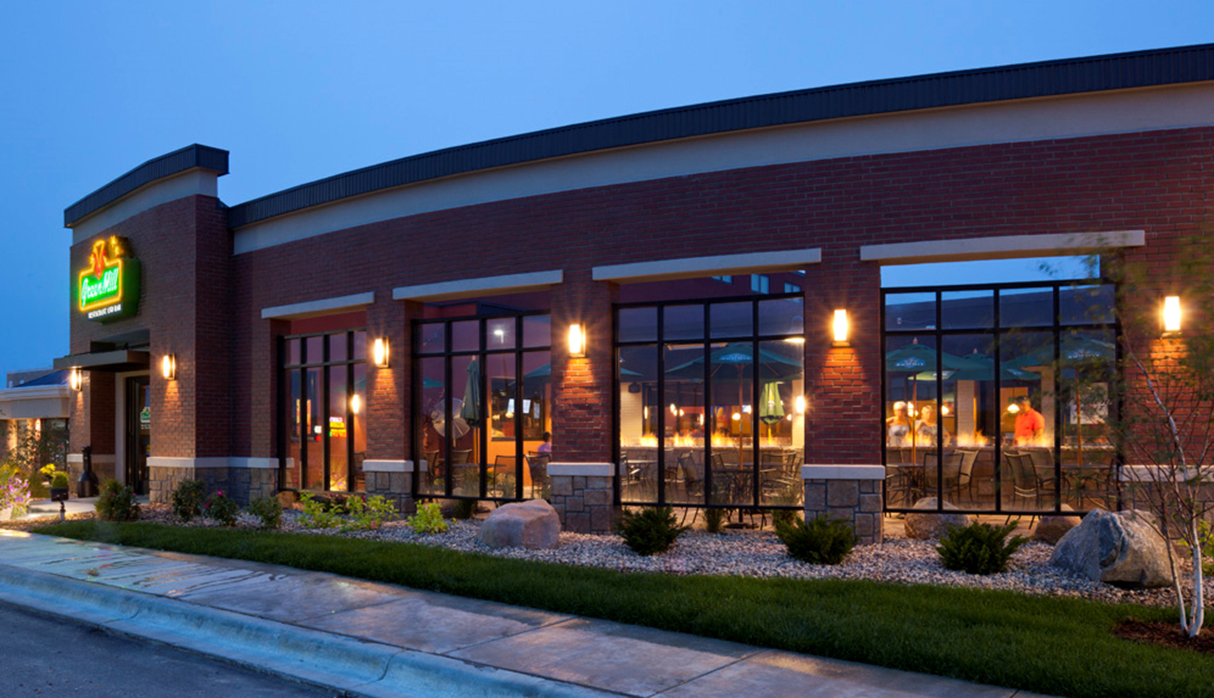 Nighttime outside view of the restaurant attached to Legacy Property in Willmar, MN