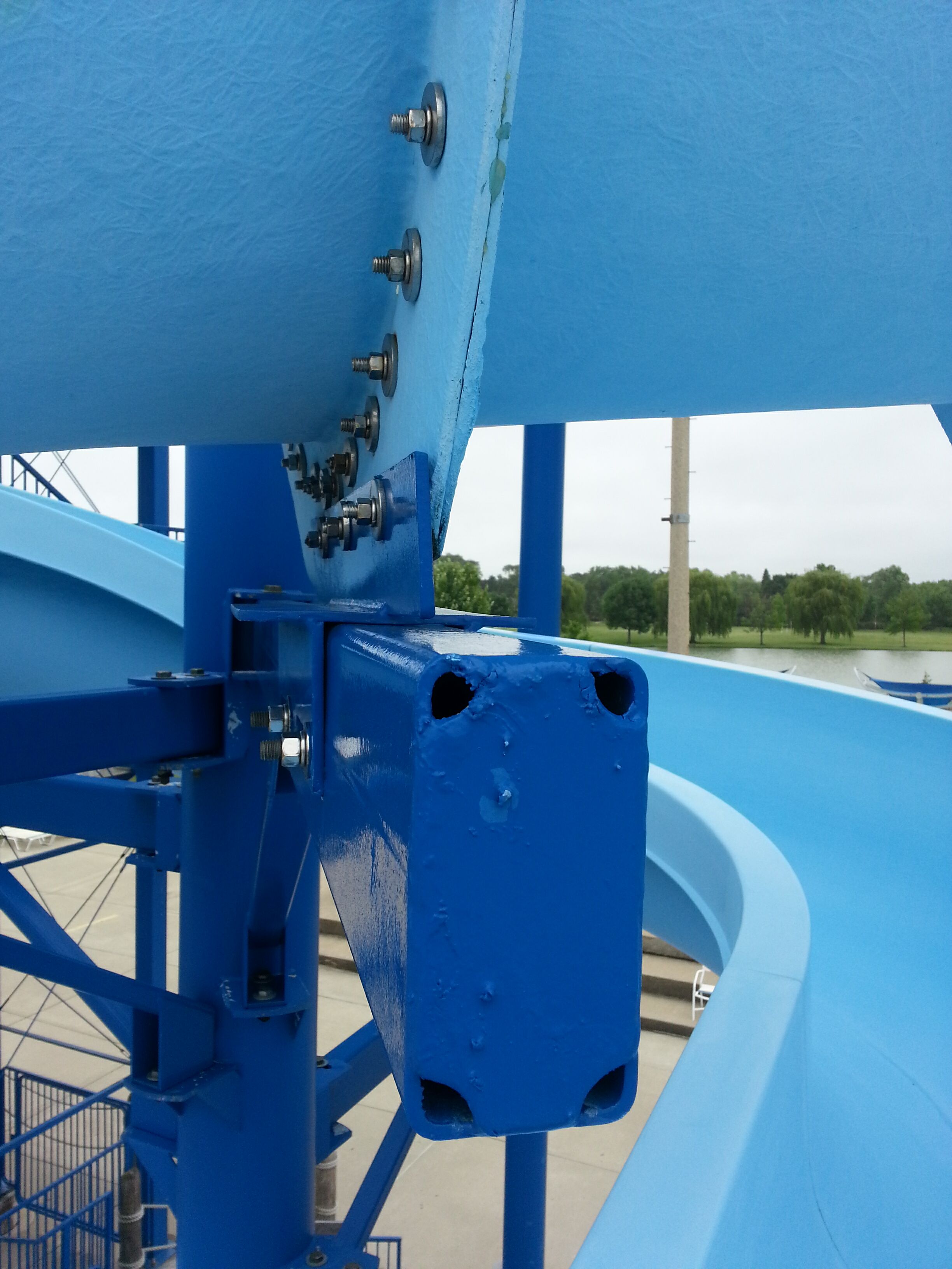 Close up of a blue body water slide