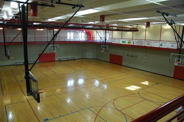 Inside gym and basketball court