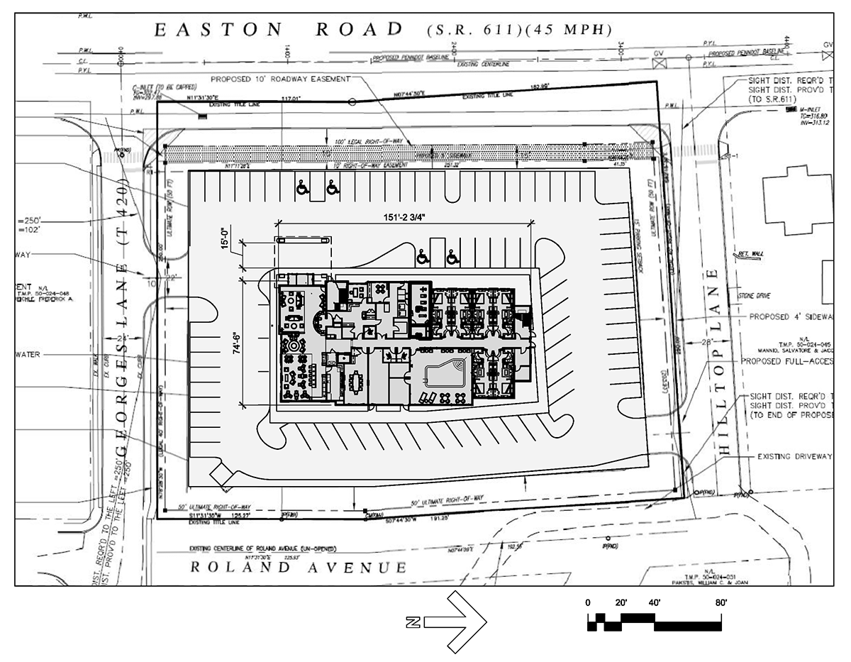 Drawing of aerial view, including the parking lot, of hotel